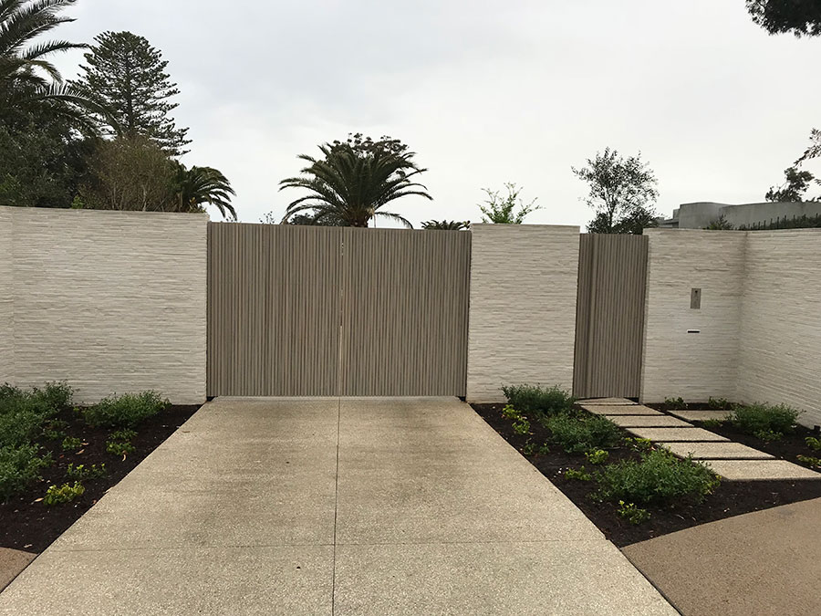 Swing-gates-clad-with-cedar-batons